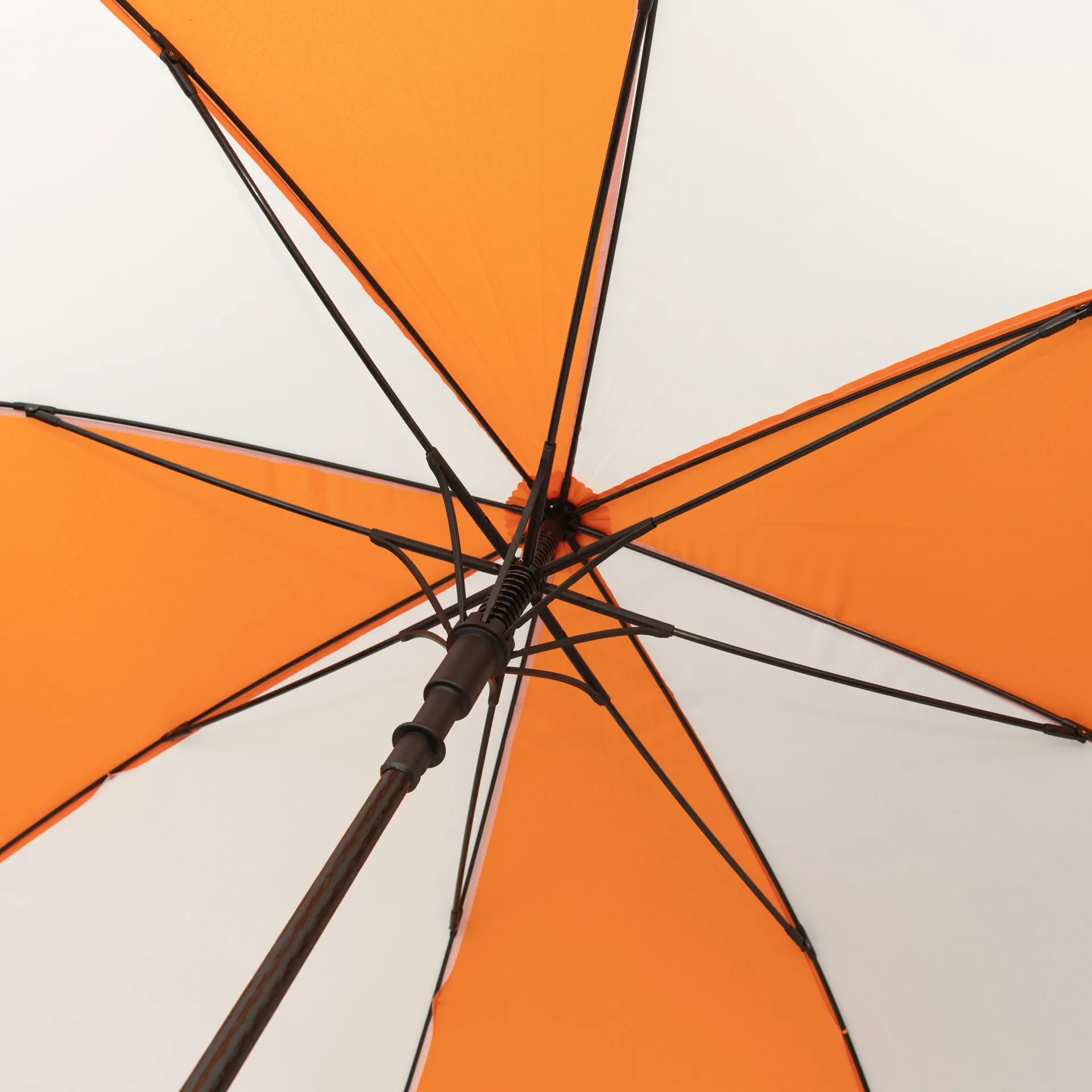 orange_white_internal Custom branded promotional umbrella - no minimum order. Orange and white golf umbrella - inside frame.