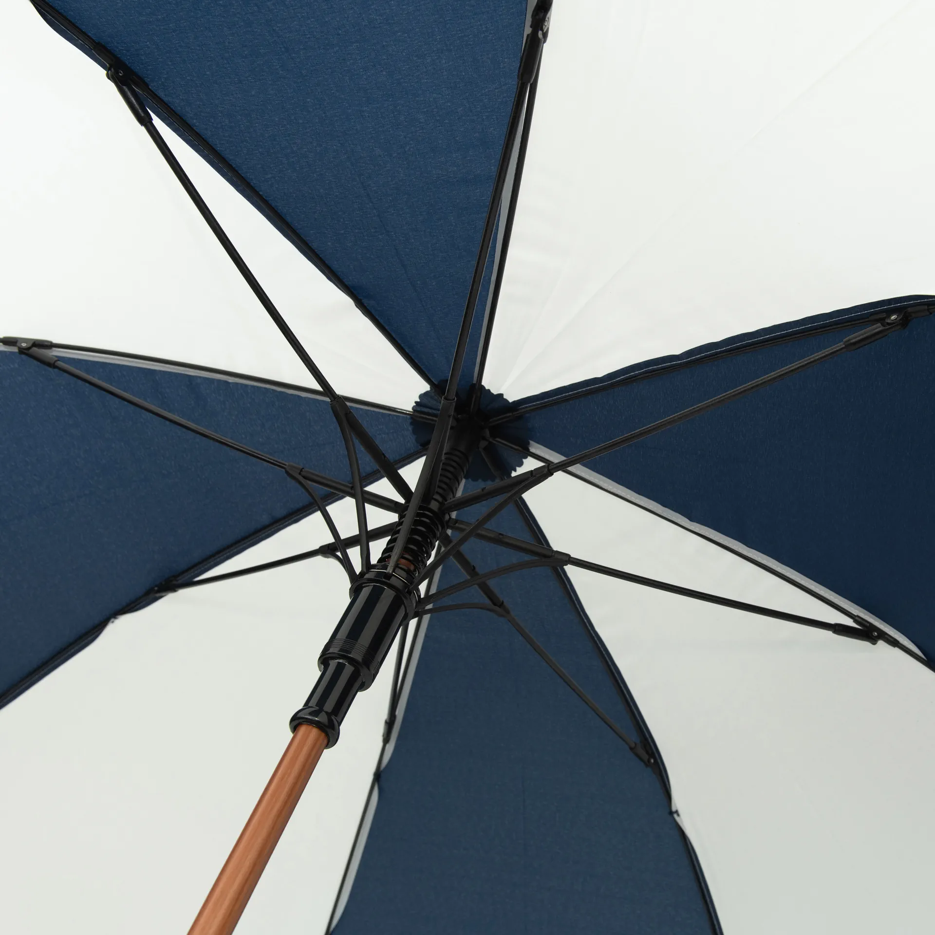Custom branded promotional umbrella - no minimum order. Navy and white - internal picture.