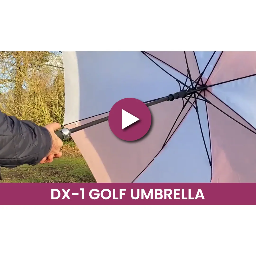 Baby Pink & White Custom Branded Umbrella in Use Baby pink & white custom branded umbrella in use showing quality and wind resistance